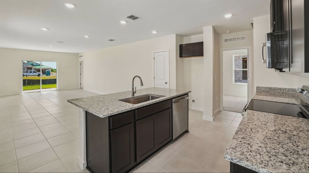 Furnished interior view inside a new home in Willowbrook North, Winter Haven (Image 11).