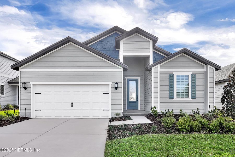Front exterior of a new home in Jennings Farm, Middleburg, FL, highlighting curb appeal (Image 2). Front exterior of a new home in Jennings Farm, Middleburg, FL, highlighting curb appeal (Image 2).