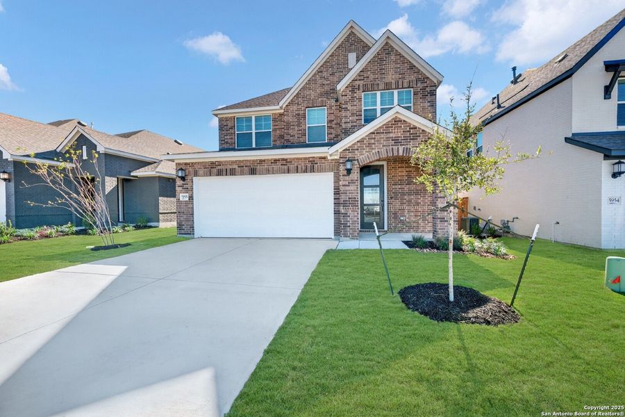 Front exterior of a new home in , New Braunfels, TX, highlighting curb appeal (Image 2). Front exterior of a new home in , New Braunfels, TX, highlighting curb appeal (Image 2).