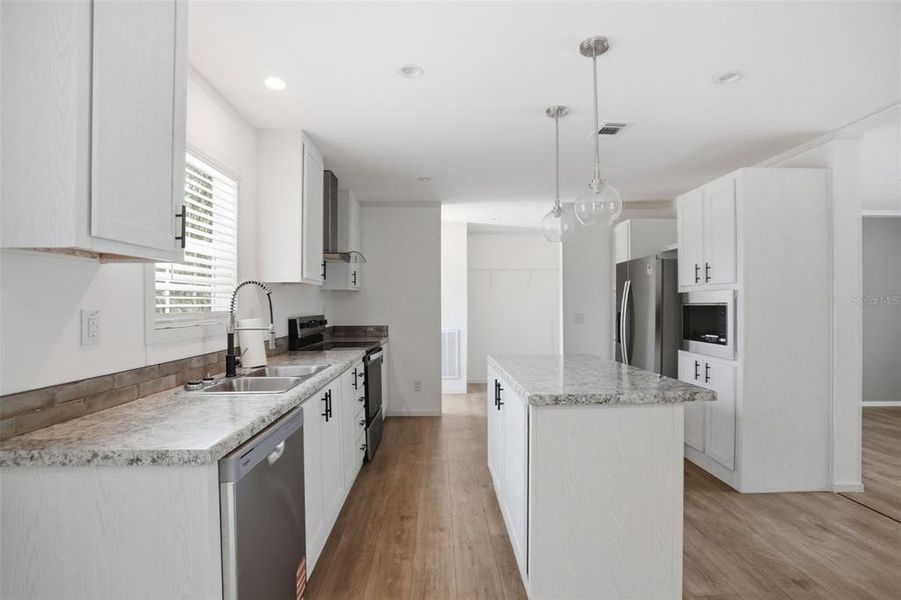 Furnished interior view inside a new home in , Weeki Wachee (Image 10).