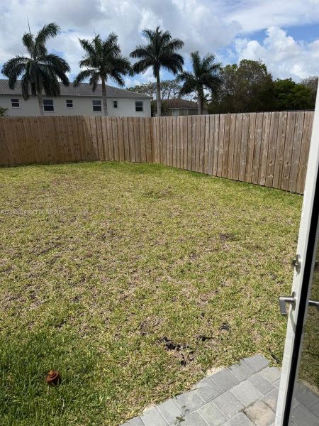 Exterior details and patio area of a home in , Homestead (Image 11). Exterior details and patio area of a home in , Homestead (Image 11).