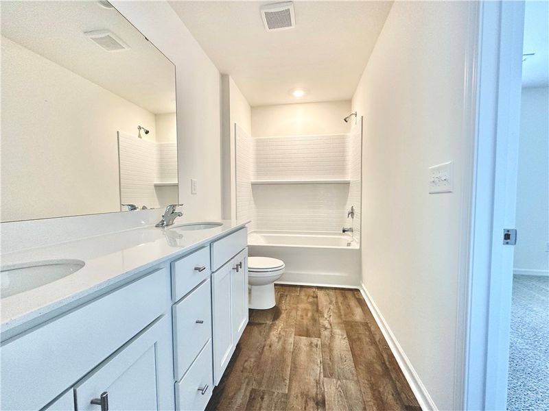 Furnished interior view inside a new home in Champions Village at Cherry Hill, Pendleton (Image 11).