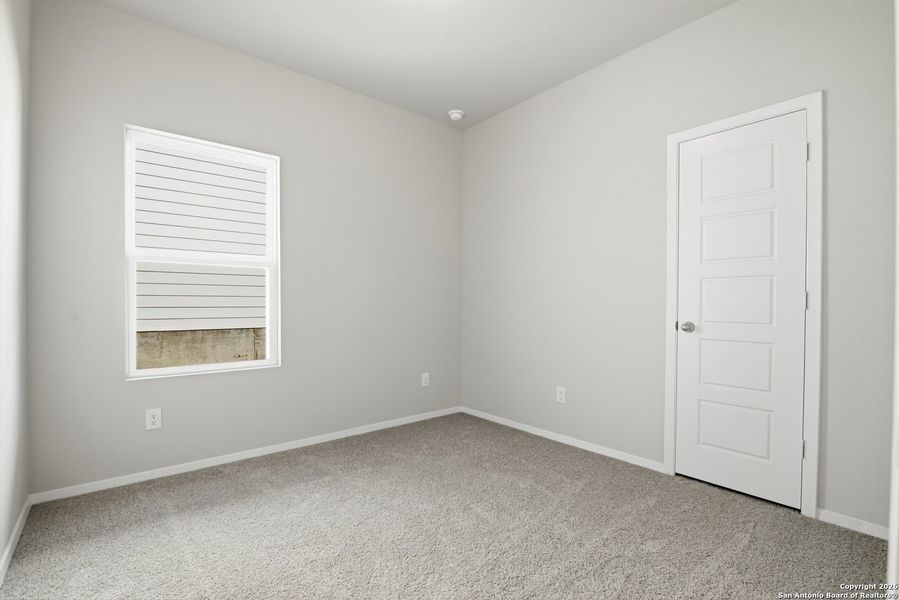 Spacious, unfurnished interior of a new home in Hunters Ranch, San Antonio (Image 40).
