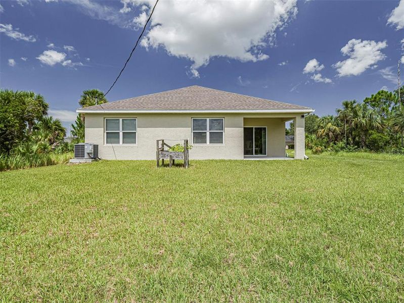 Front exterior of a new home in , Palm Bay, FL, highlighting curb appeal (Image 25). Front exterior of a new home in , Palm Bay, FL, highlighting curb appeal (Image 25).