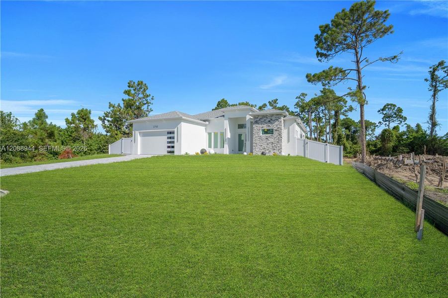Exterior details and patio area of a home in , Lehigh Acres (Image 28).