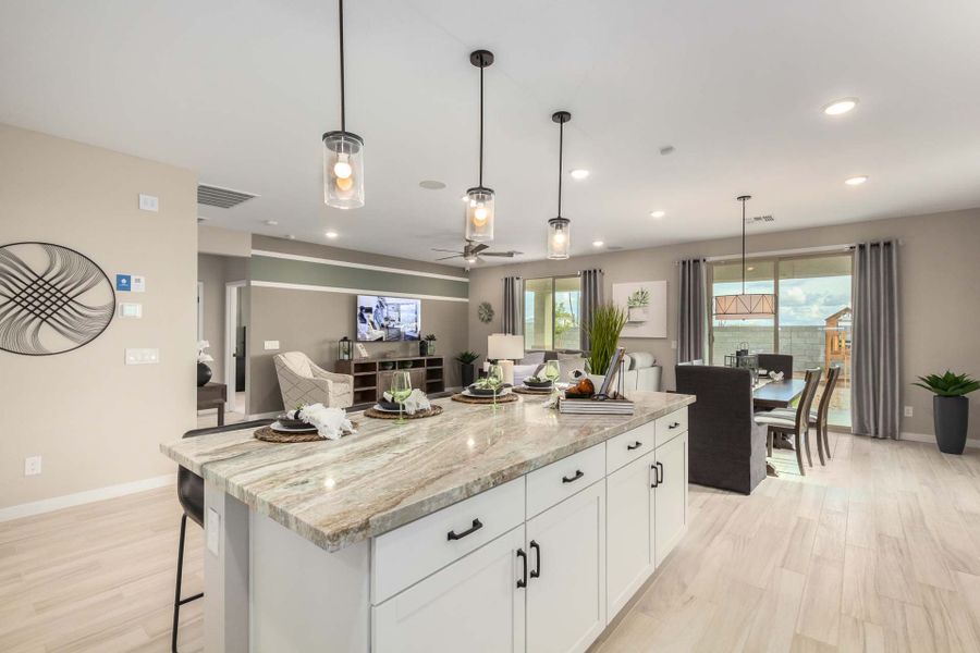 Kitchen & Great Room & Dining Area | Citrus | The Villages at North Copper Canyon – Valley Series | New homes in Surprise, Arizona | Landsea Homes