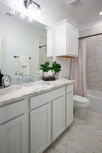 Representative furnished interior of a home built from the The Rose by Avonley Homes in Pinemont, Bryan (Image 33).