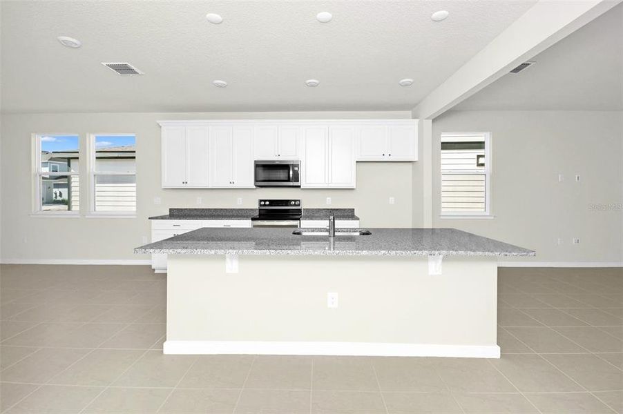 Furnished interior view inside a new home in , St. Cloud (Image 3).
