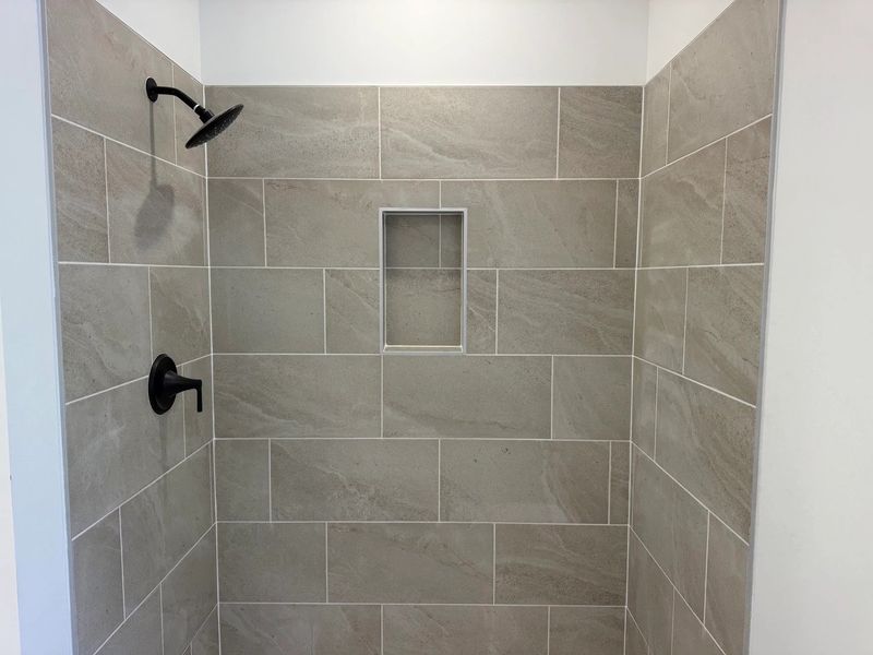 Primary Bath featuring the AW Collection® Artisan - A blend of artisan textures and calm, grounding colors. Primary Bath featuring the AW Collection® Artisan - A blend of artisan textures and calm, grounding colors.