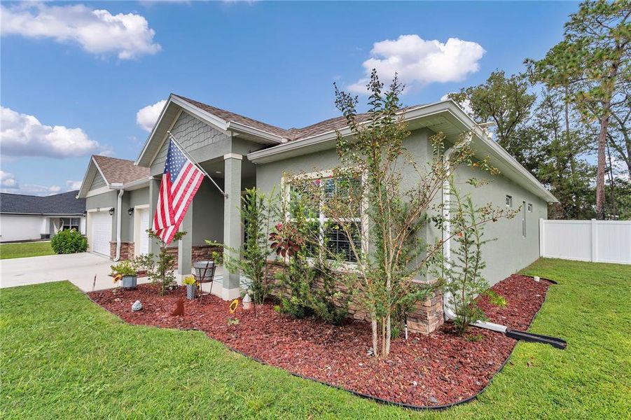 Front exterior of a new home in , Ocala, FL, highlighting curb appeal (Image 20). Front exterior of a new home in , Ocala, FL, highlighting curb appeal (Image 20).