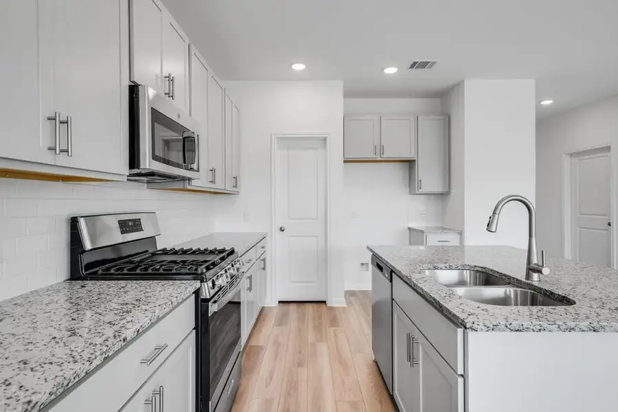 Furnished interior view inside a new home in Lisso 50s, Pflugerville (Image 7).