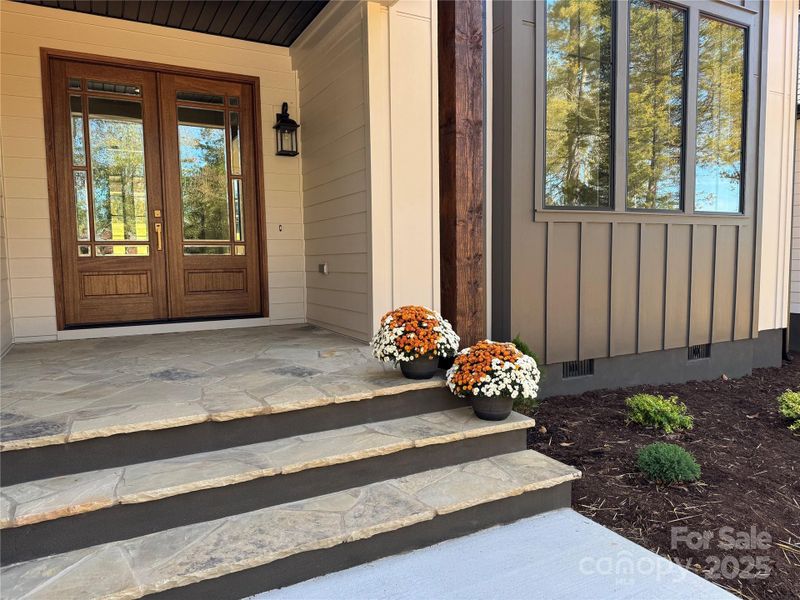 Beautiful glass front entry with flagstone Beautiful glass front entry with flagstone