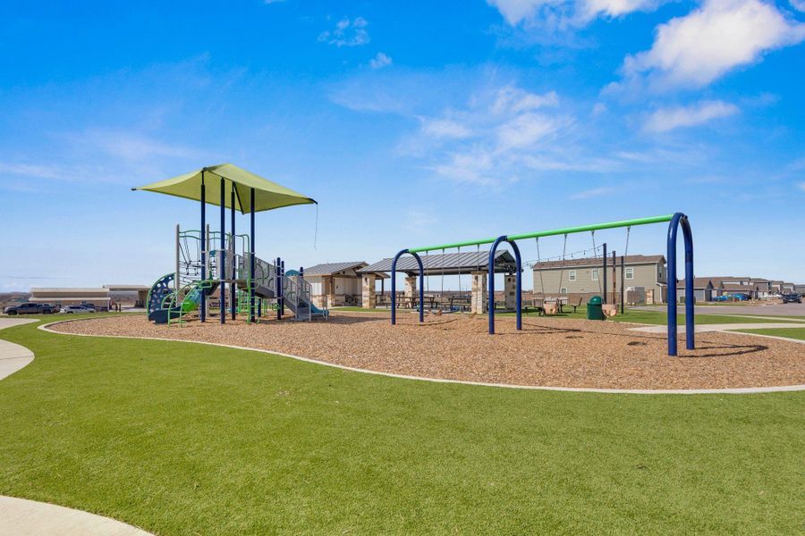 Community playground with a yard