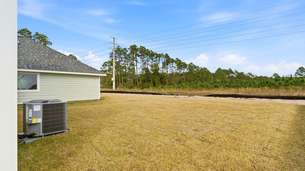 Exterior details and patio area of a home in Chateau Nemours, Port Saint Joe (Image 26).