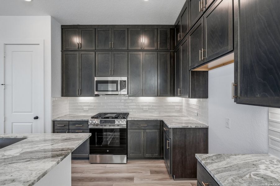 Furnished interior view inside a new home in Rose Hill, San Antonio (Image 16).