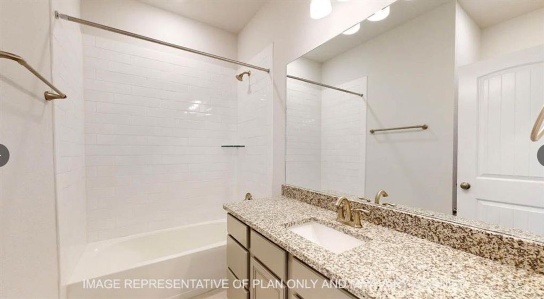 Full bath featuring washtub / shower combination and vanity Full bath featuring washtub / shower combination and vanity