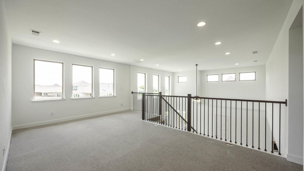 Carpeted spare room with recessed lighting Carpeted spare room with recessed lighting