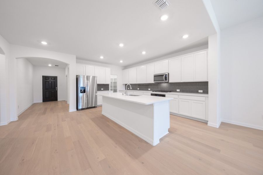 Furnished interior view inside a new home in Verandah, Royse City (Image 6).