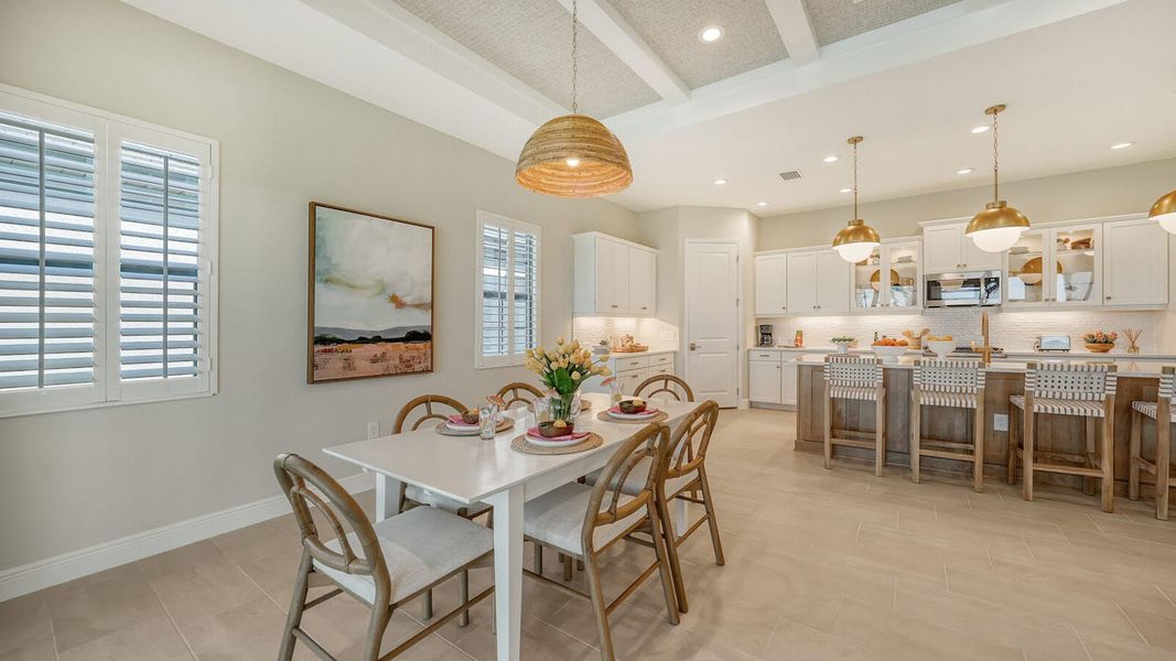 Furnished interior view inside a new home in SkySail Real Estate and Homes for Sale in Naples, FL - Neal Communities, Naples (Image 8).
