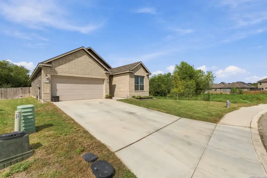 Front exterior of a new home in , San Antonio, TX, highlighting curb appeal (Image 25).