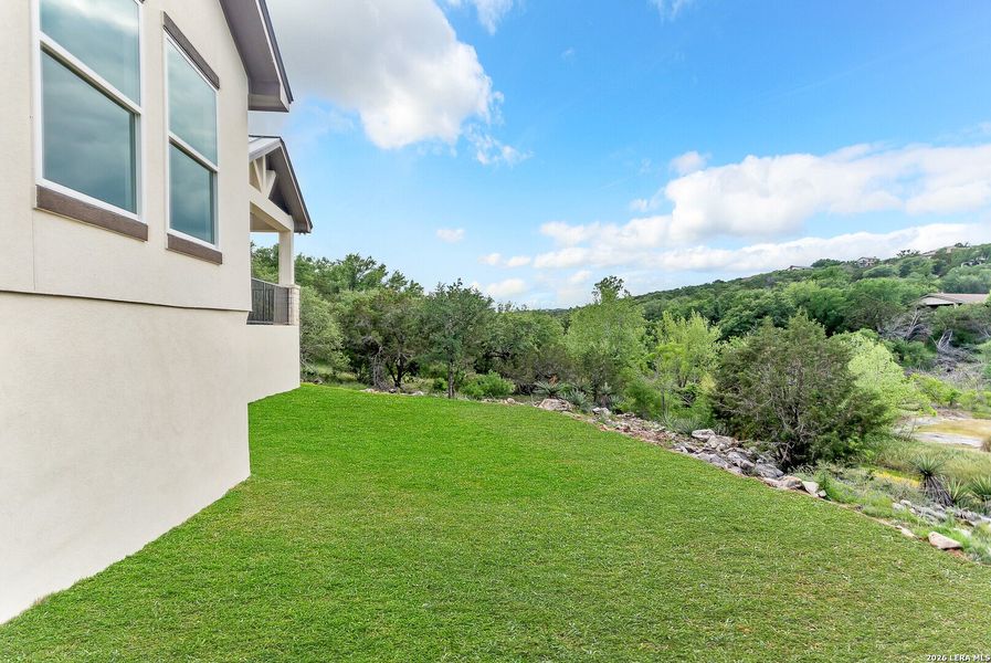 Exterior details and patio area of a home in , Blanco (Image 4).