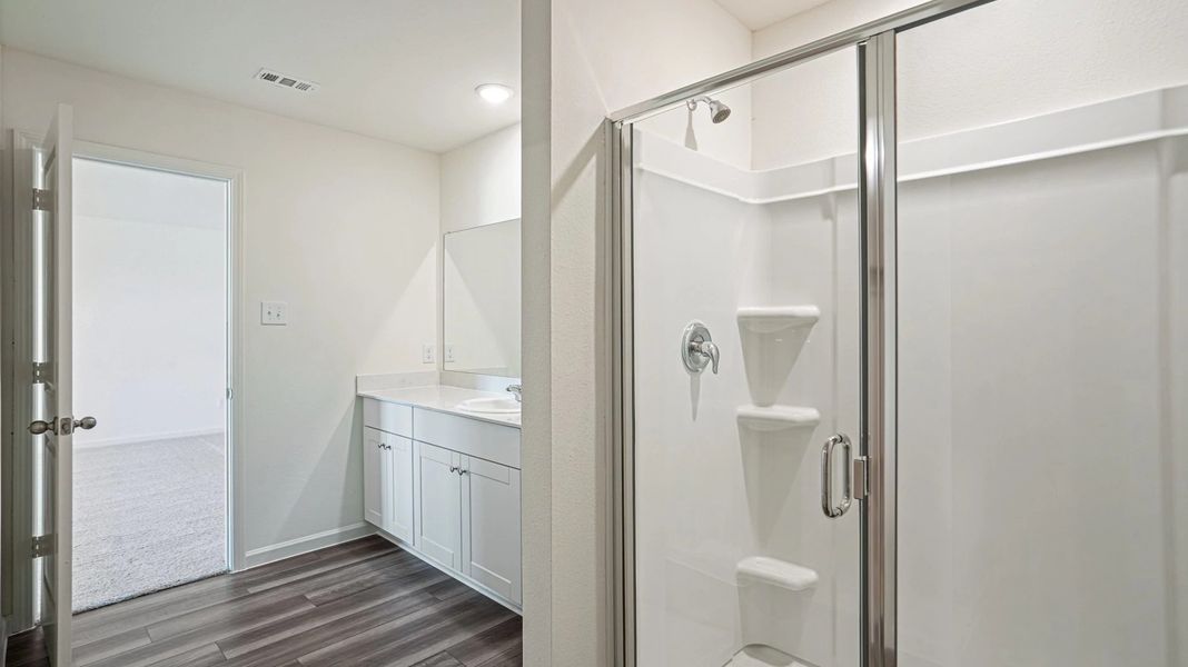 Representative furnished interior of a home built from the Pioneer by Starlight Homes in Avalon Ridge, Cut and Shoot (Image 13).