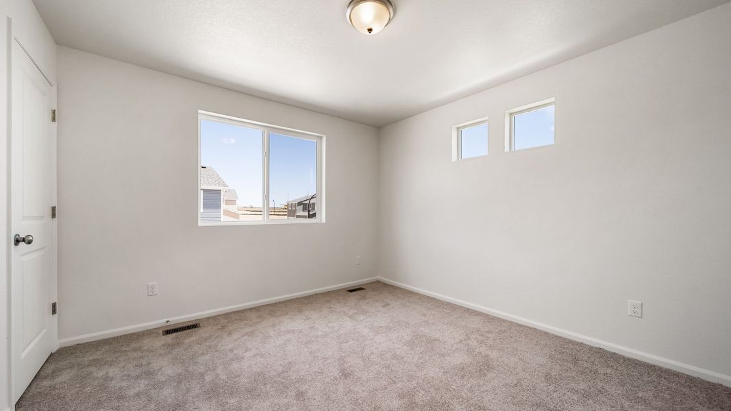 Spacious, unfurnished interior of a new home in Banning Lewis Ranch, Colorado Springs (Image 15).