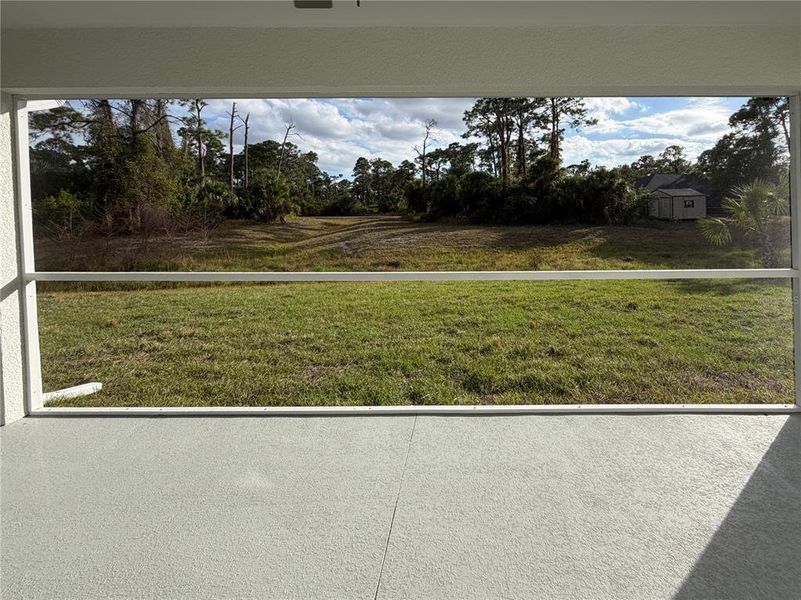 Exterior details and patio area of a home in , North Port (Image 25).