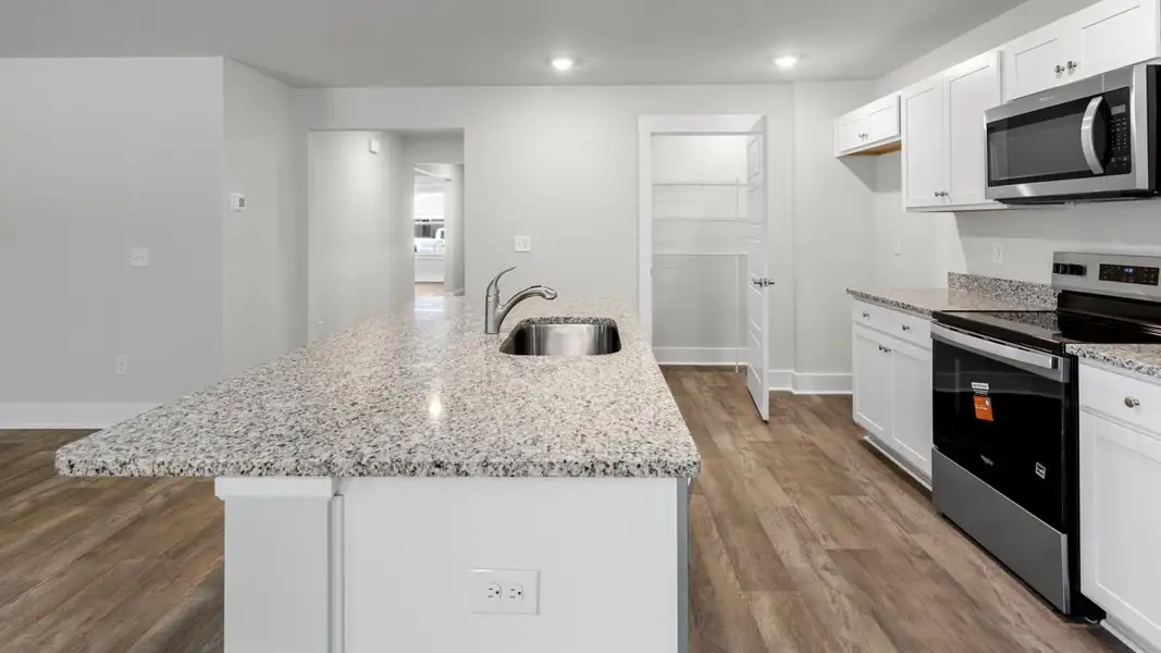Furnished interior view inside a new home in Cedar Hill Landing, Navassa (Image 6).