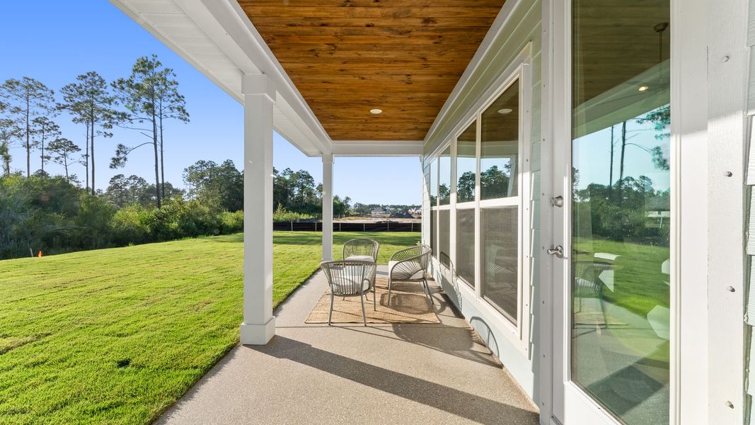 Exterior details and patio area of a home in Breakfast Point East Phase II, Panama City Beach (Image 3).