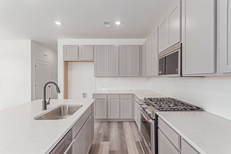 Furnished interior view inside a new home in Painted Prairie, Aurora (Image 8). Furnished interior view inside a new home in Painted Prairie, Aurora (Image 8).