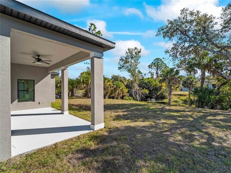 Exterior details and patio area of a home in , North Port (Image 28).
