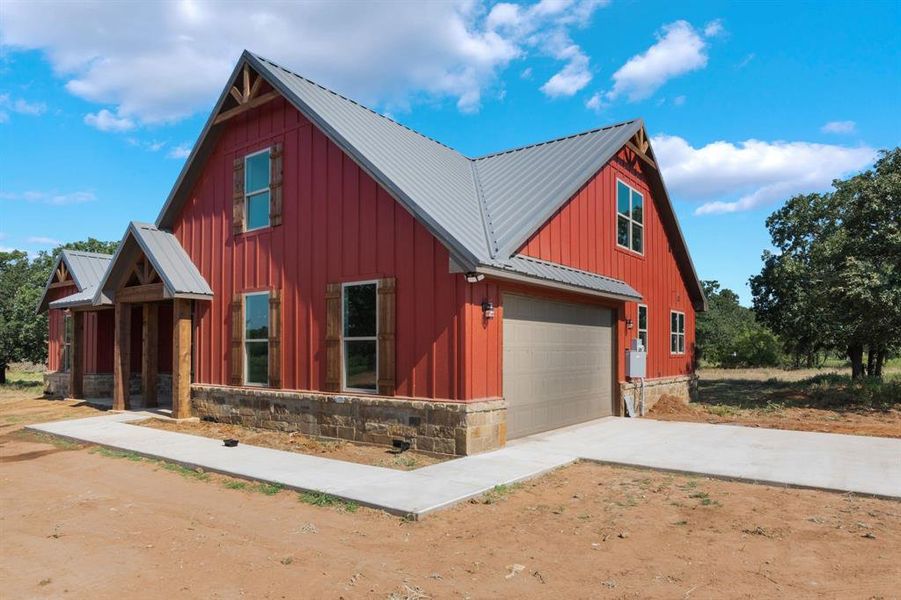 Front exterior of a new home in , Loving, TX, highlighting curb appeal (Image 2).