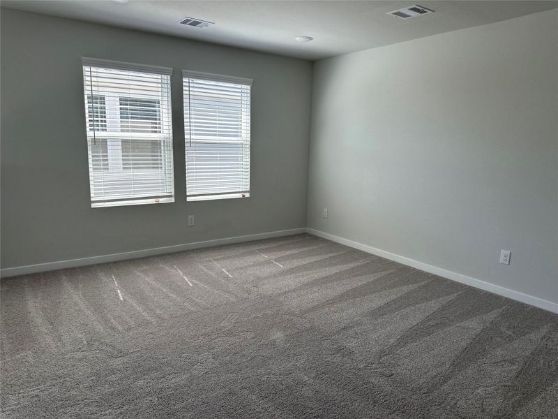 Spacious, unfurnished interior of a new home in Lonestar Collection at Aurora, Katy (Image 18).