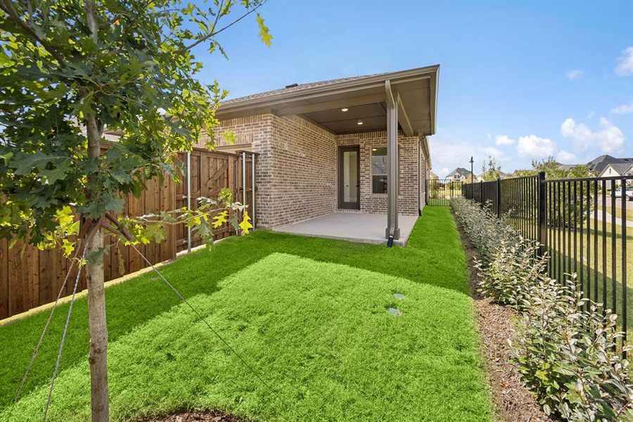 Exterior details and patio area of a home in Mantua Point Gardens, Van Alstyne (Image 2). Exterior details and patio area of a home in Mantua Point Gardens, Van Alstyne (Image 2).