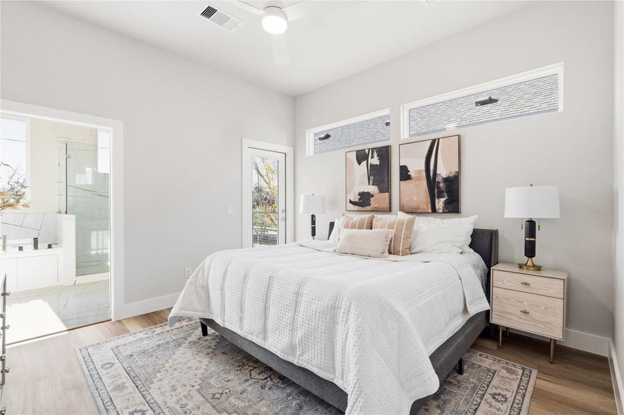 The primary suite is positioned as a true retreat, quiet, light-filled, and thoughtfully separated from the main living areas. Clerestory windows bring in soft natural light, while direct access to a private covered balcony creates an easy morning ritual for coffee or fresh air. The ensuite bath sits just beyond, completing a layout designed for comfort, privacy, and daily ease.