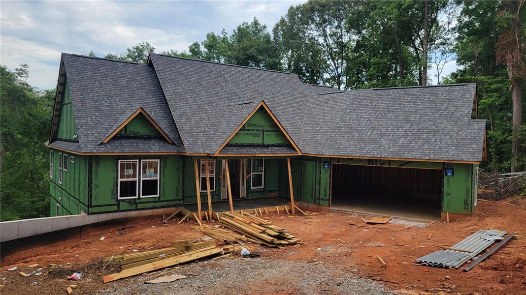 New construction with a durable shingle roof await New construction with a durable shingle roof await