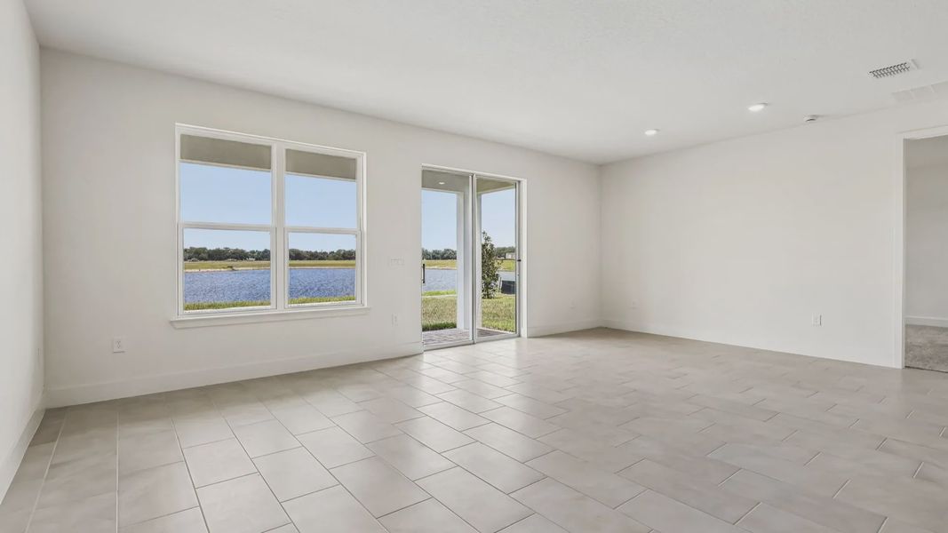 Furnished interior view inside a new home in Ardisia Park, New Smyrna Beach (Image 4).