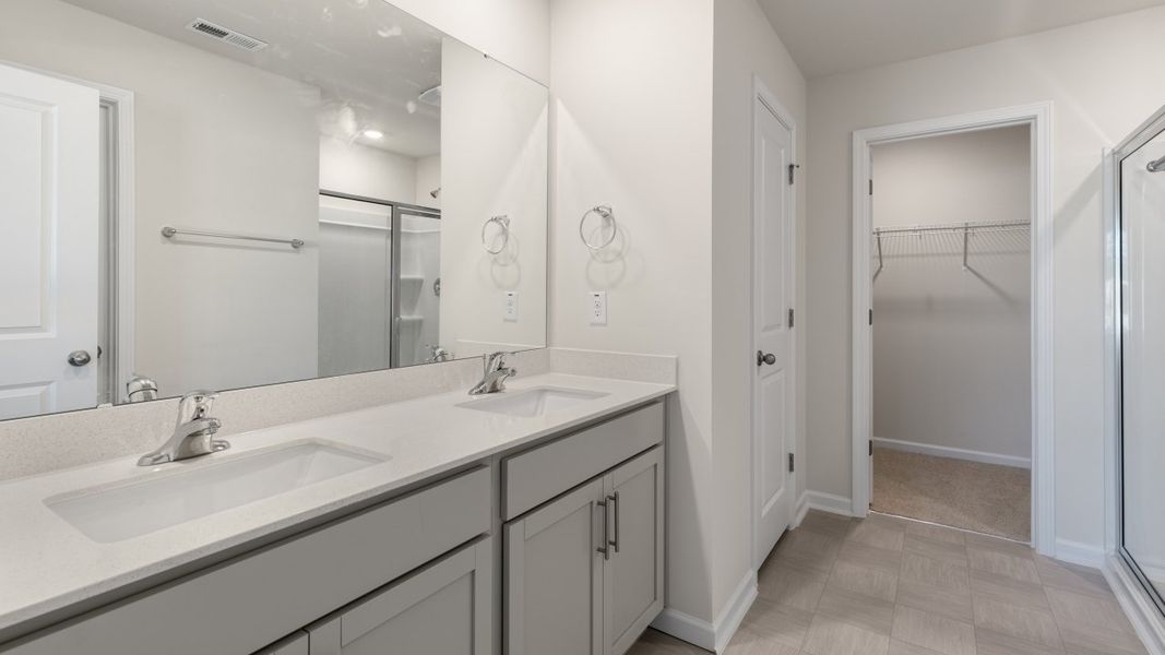 Furnished interior view inside a new home in The Grove at Matthews Landing, Fuquay Varina (Image 8).