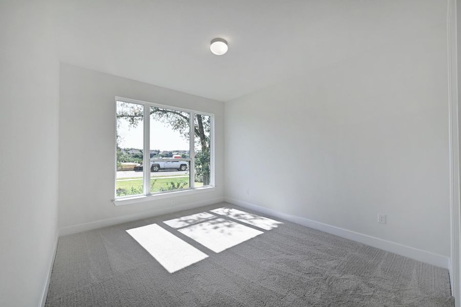 Spacious, unfurnished interior of a new home in Lakeside at Tessera, Lago Vista (Image 35).