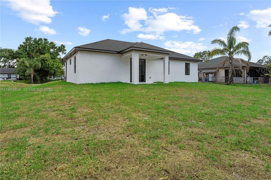 Exterior details and patio area of a home in , Lehigh Acres (Image 36). Exterior details and patio area of a home in , Lehigh Acres (Image 36).