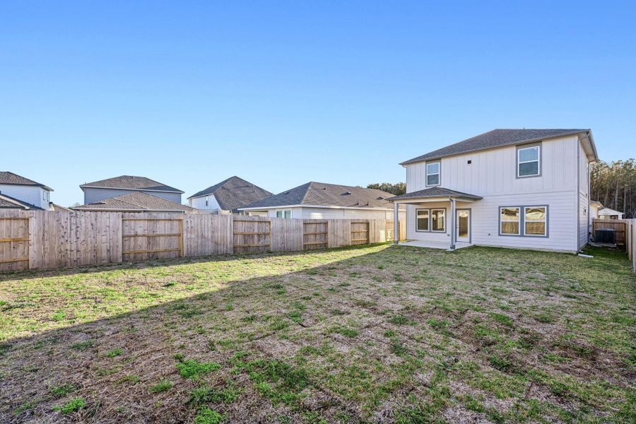 Exterior details and patio area of a home in Landing Meadows - Traditional Series, New Caney (Image 27). Exterior details and patio area of a home in Landing Meadows - Traditional Series, New Caney (Image 27).