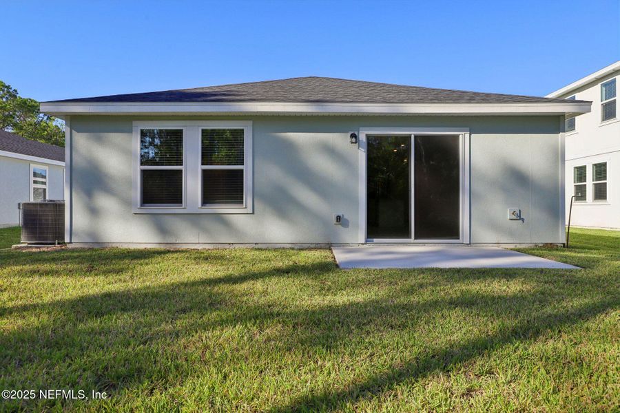 Exterior details and patio area of a home in Flagler Village - Classic Series, Palm Coast (Image 20).
