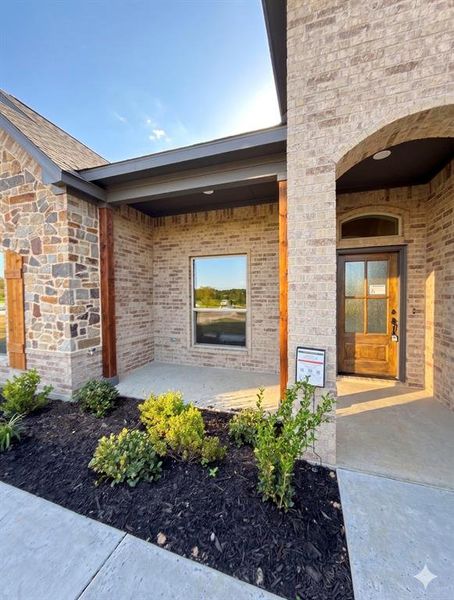 Exterior details and patio area of a home in The Ranches At Valley View, Springtown (Image 3).