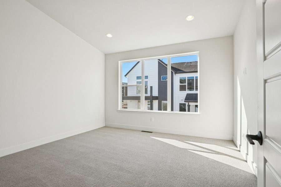 Spacious, unfurnished interior of a new home in Loretto Heights - Rise Collection, Denver (Image 17).