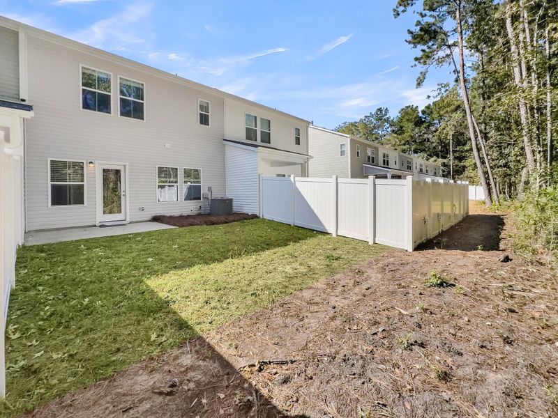 Exterior details and patio area of a home in Willow Bend Townhomes, North Charleston (Image 18). Exterior details and patio area of a home in Willow Bend Townhomes, North Charleston (Image 18).