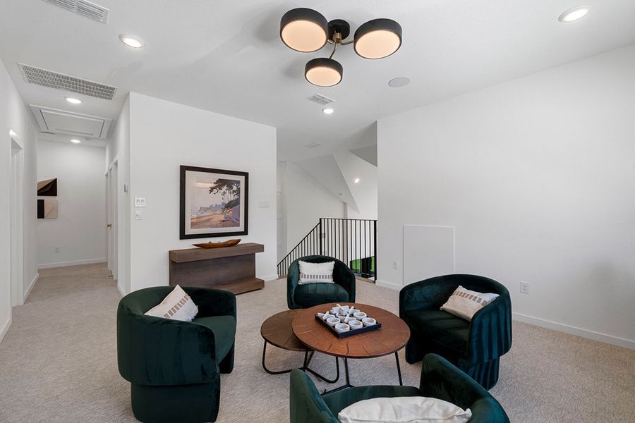 Furnished interior view inside a new home in The Highlands 50', Porter (Image 31).