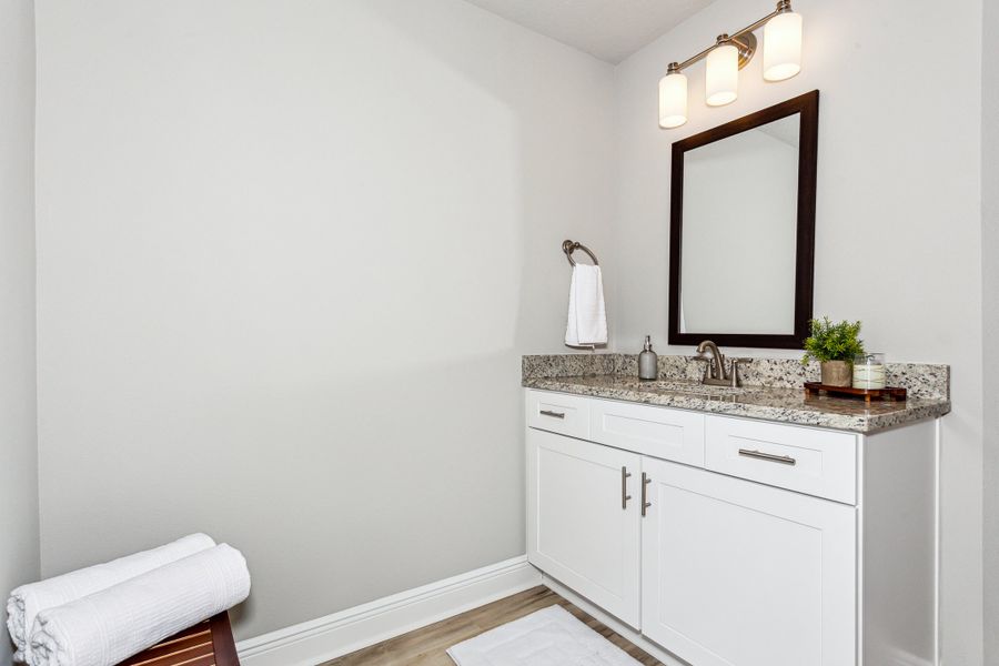Representative furnished interior of a home built from the The Sapphire by Herbst Homes in Clear Water Landing, Milton (Image 47).