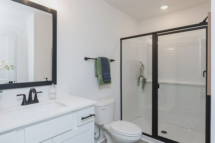 Representative furnished interior of a home built from the 1557 Townhome by Adams Homes in Parkstone Place Townhomes, Roebuck (Image 14).