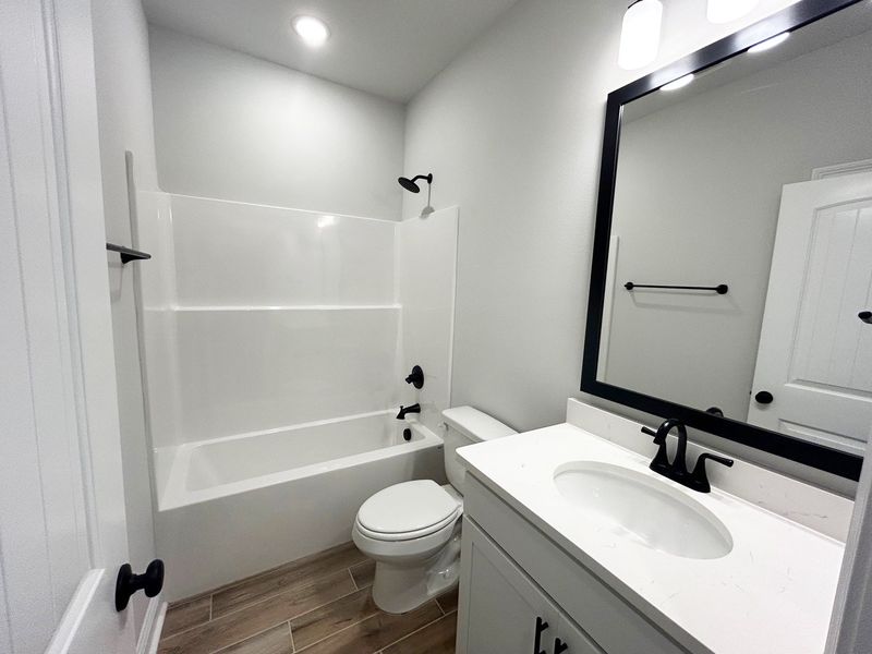 Furnished interior view inside a new home in The Bluffs at Lafayette, Freeport (Image 6).